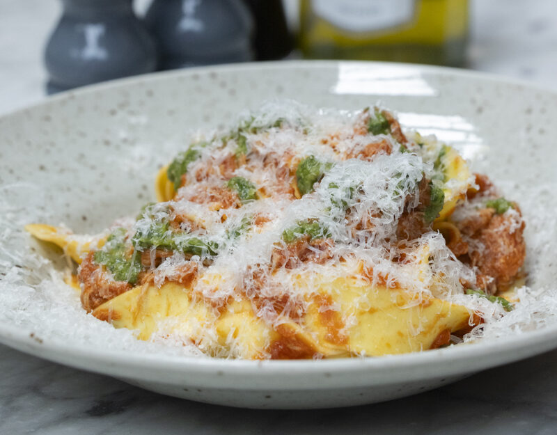 A photo of Braised Pork Ragu from NoLIta's new menu.