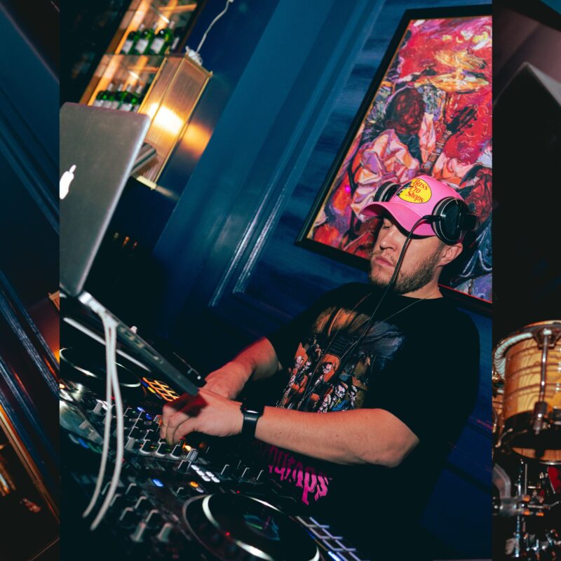 Picture Depicts DJ Playing on sonsole, Saxphonist and drummer playing and enjoying.